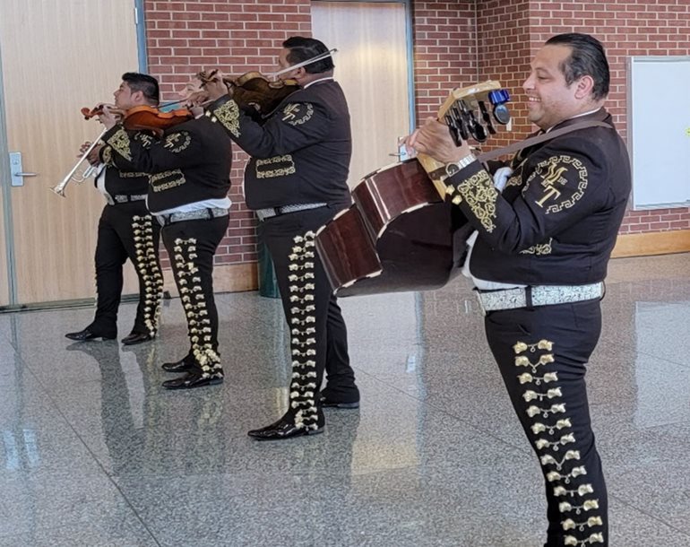 A picture of a Mariachi band performing